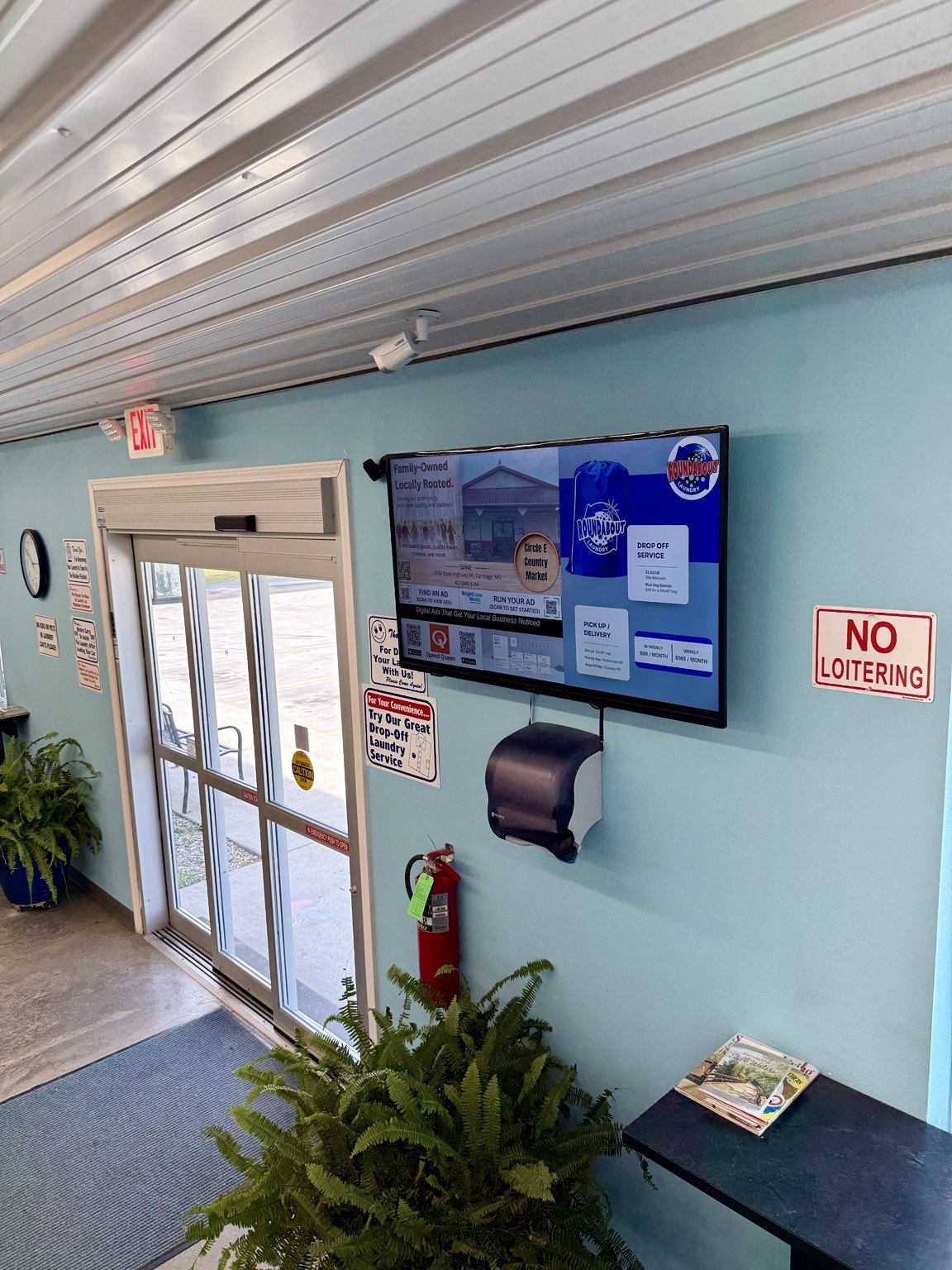 BrightLoop screen inside a laundromat